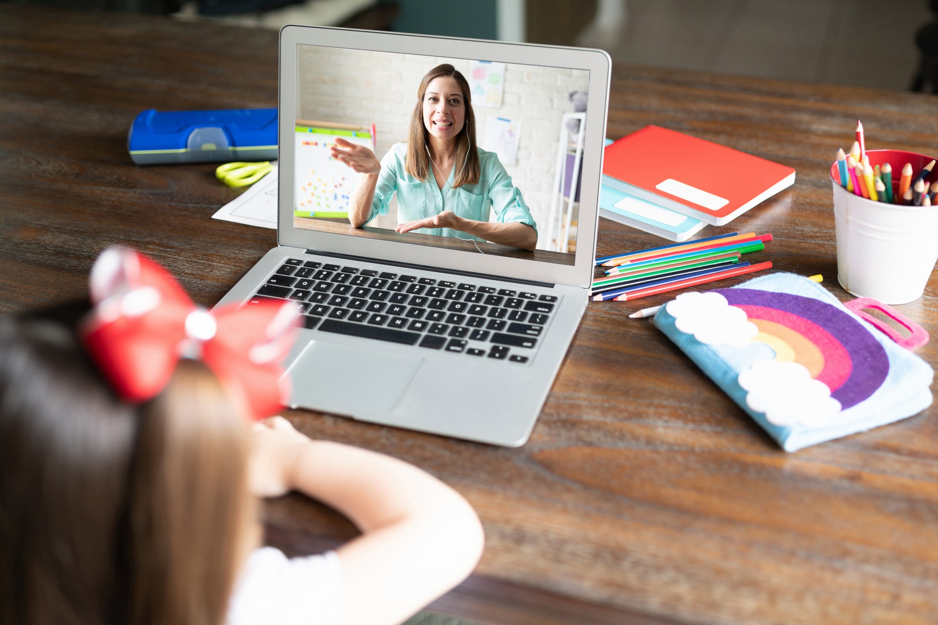 Little girl taking online classes